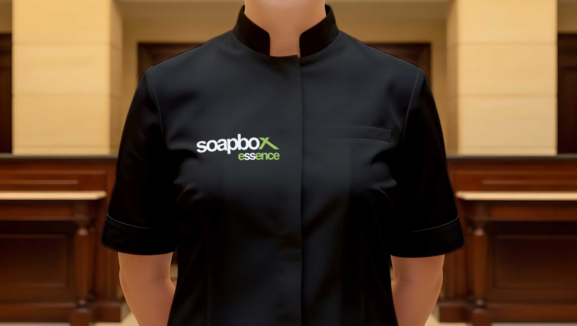 Soapbox Essence branded black hospitality uniform on a restaurant staff member